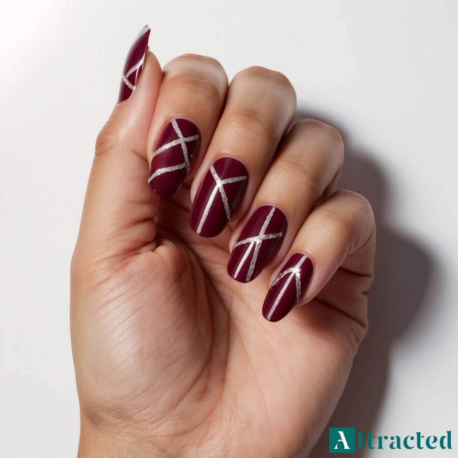 Wzory geometryczne ze srebrnym brokatem na bordowym tle